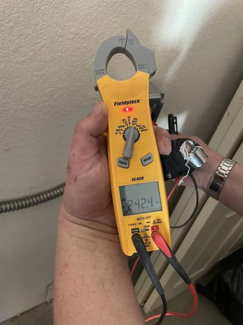 Voltage testing with clamp meter during Aluminum Wiring Replacement in Hudson